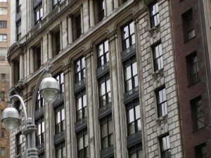 street lamps and beaux arts building